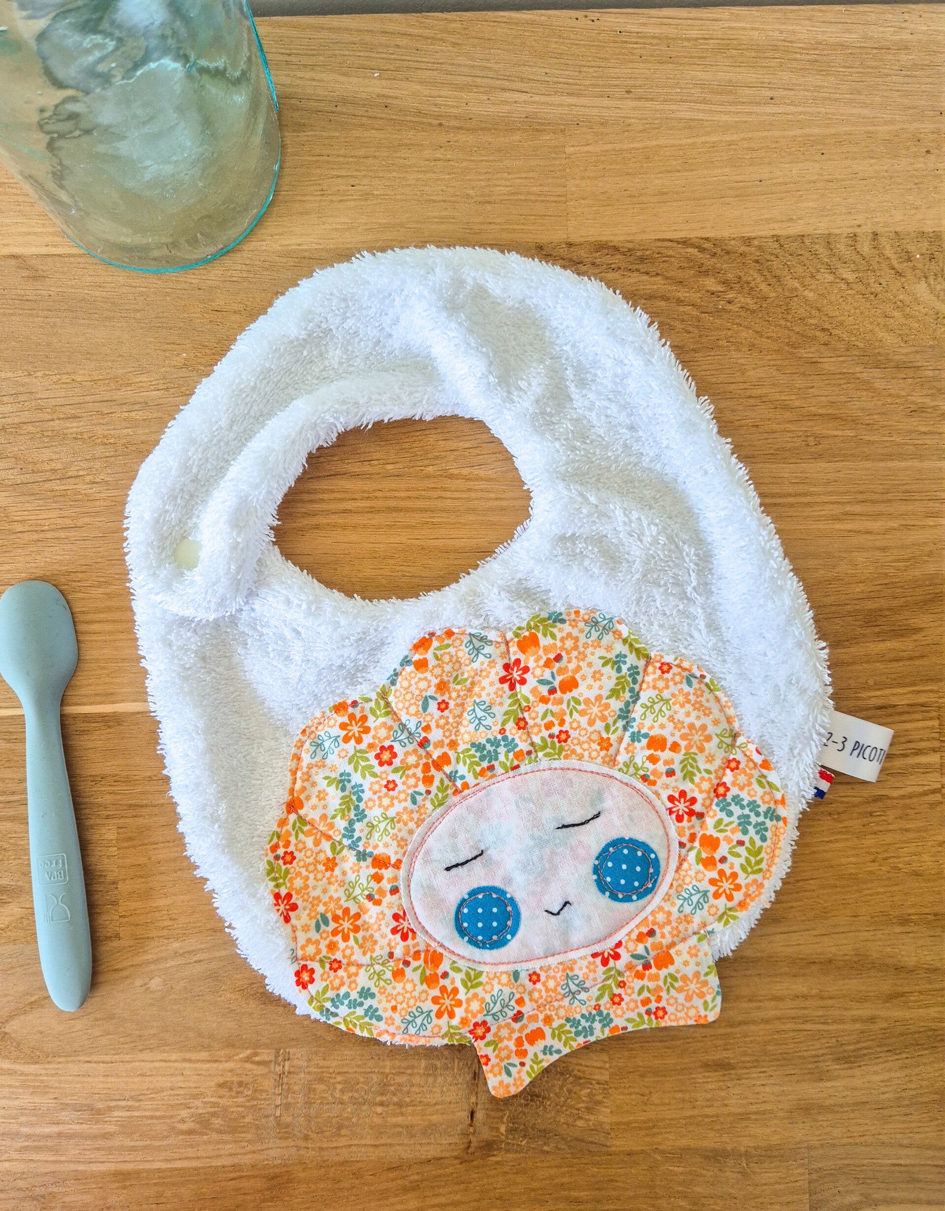 Bavoir bébé coquillage éponge