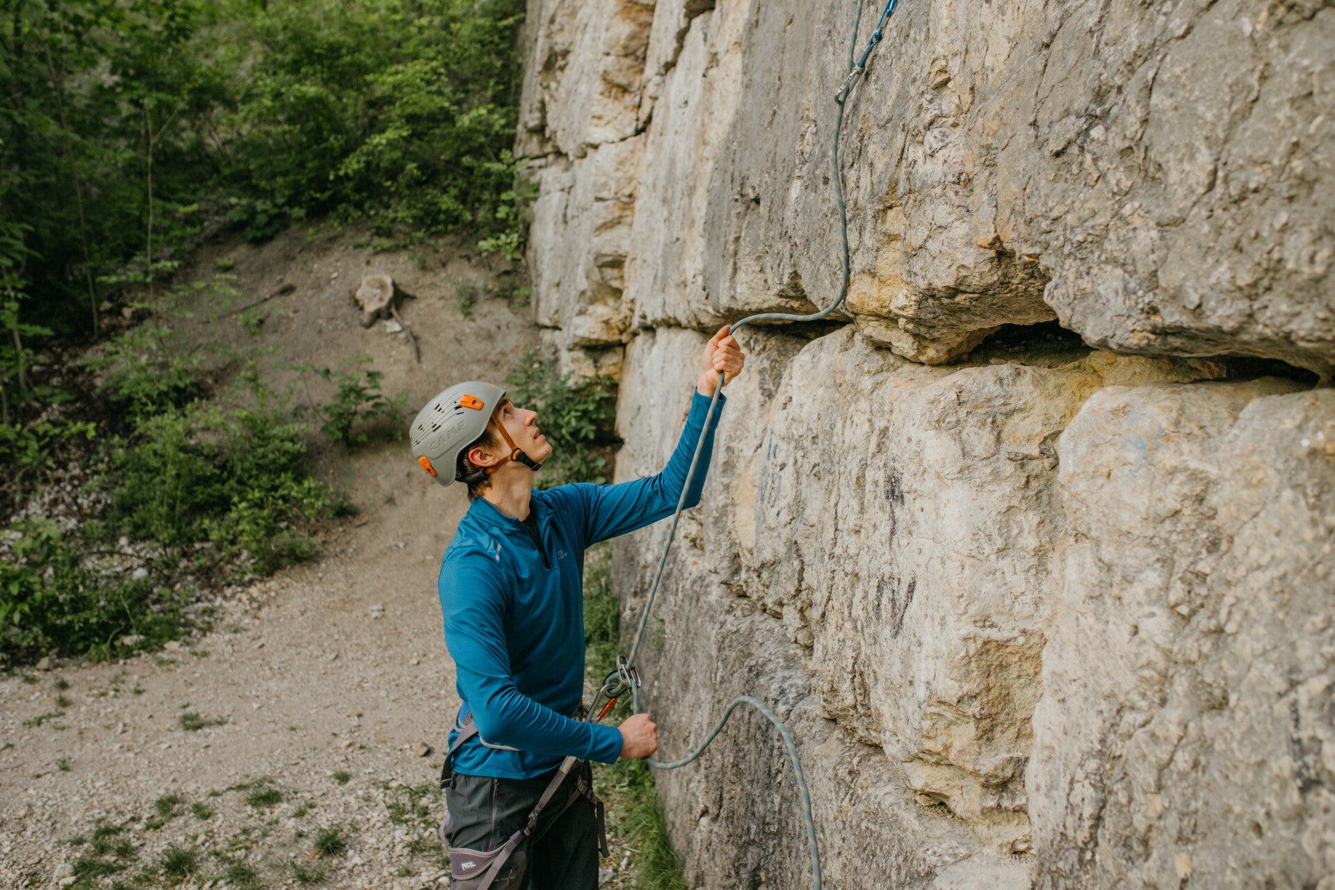 Man belaying a rock climber