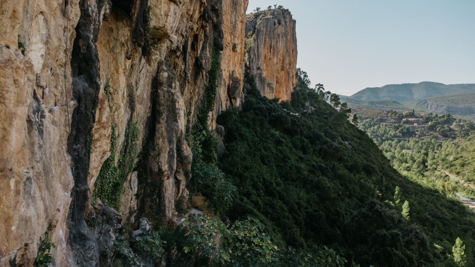 Limestone orange rocks towering over the forest