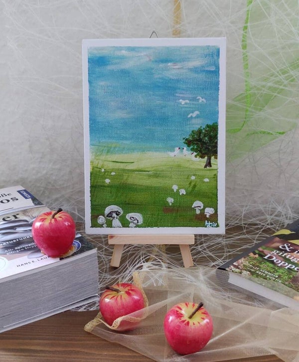 Champignonwiese mit Gänsen