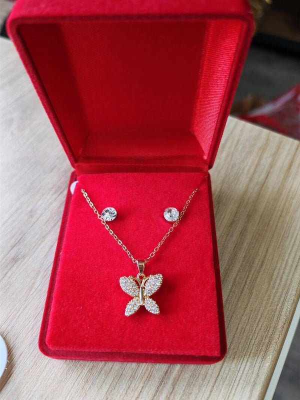 PAPILLON COULEUR OR AVEC DIAMANT