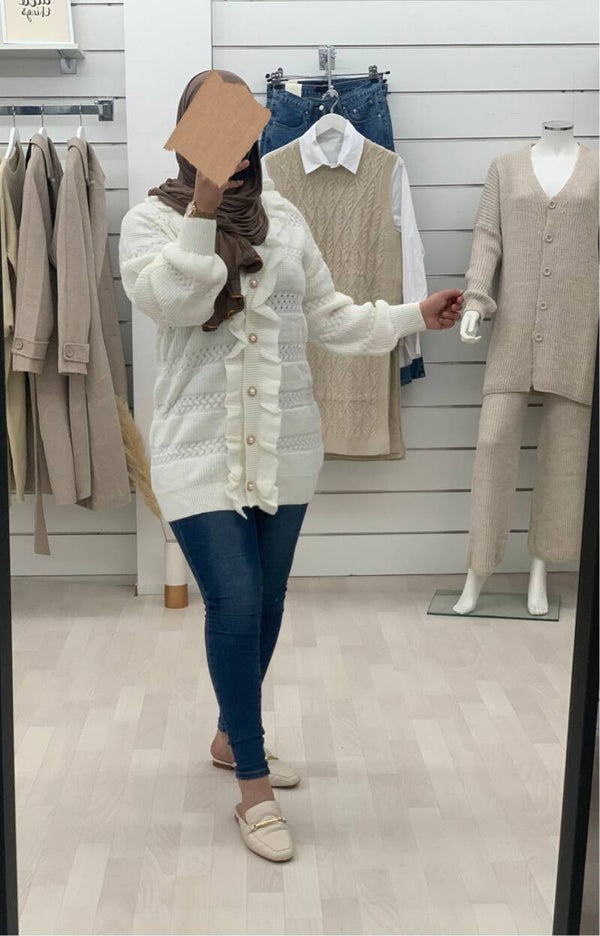 Vest met parel knopen