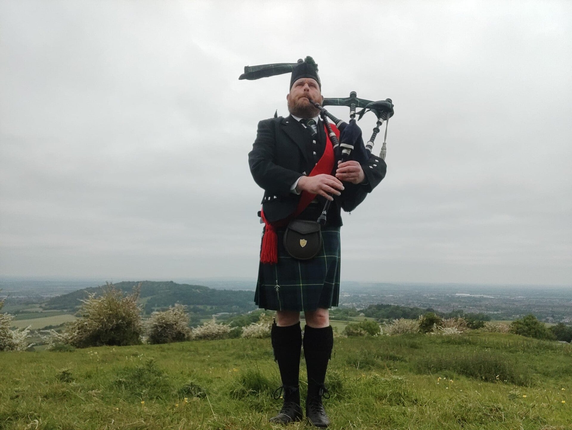 Highland piper playing in Gloucester