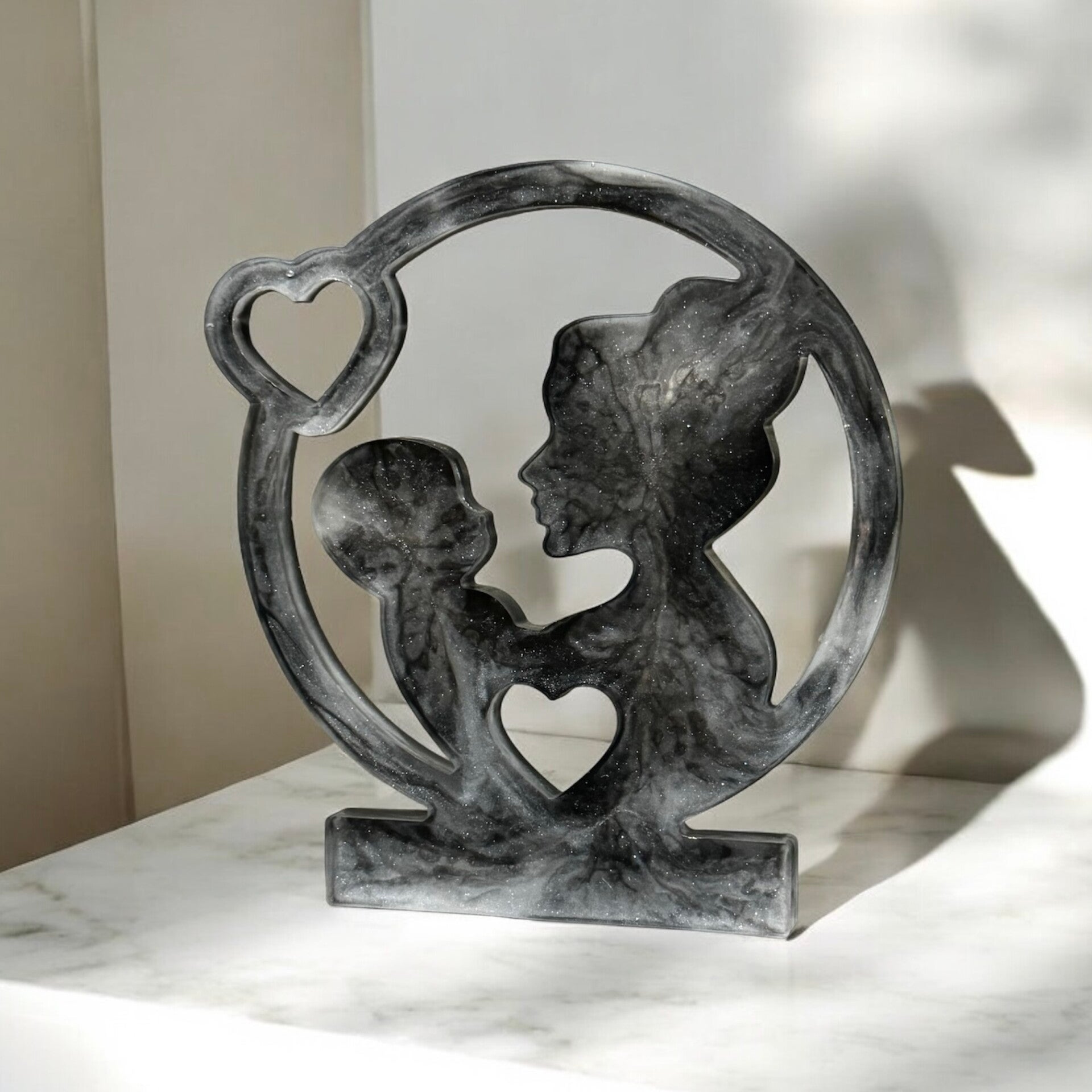 Beeldje moeder en kind