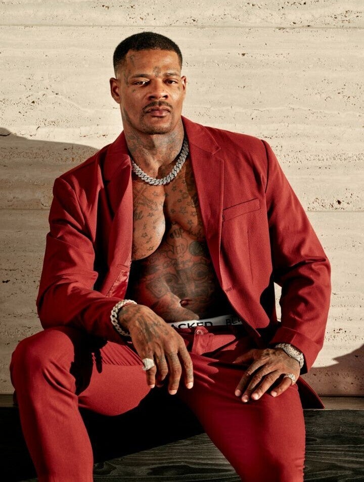 Jason Luv: Bio of A One of the Best Black Men in the Porn Industry  Jason love modeling a red suit with his chest showing as the power of the look on his face holds confidence, sex appeal, power and masculinity.
