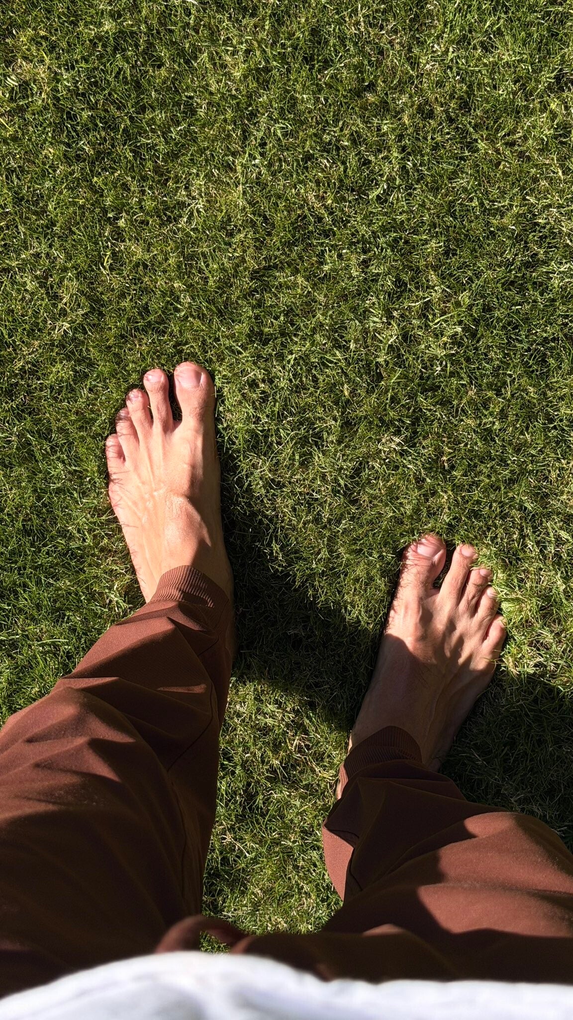 black-guy-barefoot-in-grass-outside-standard.jpg