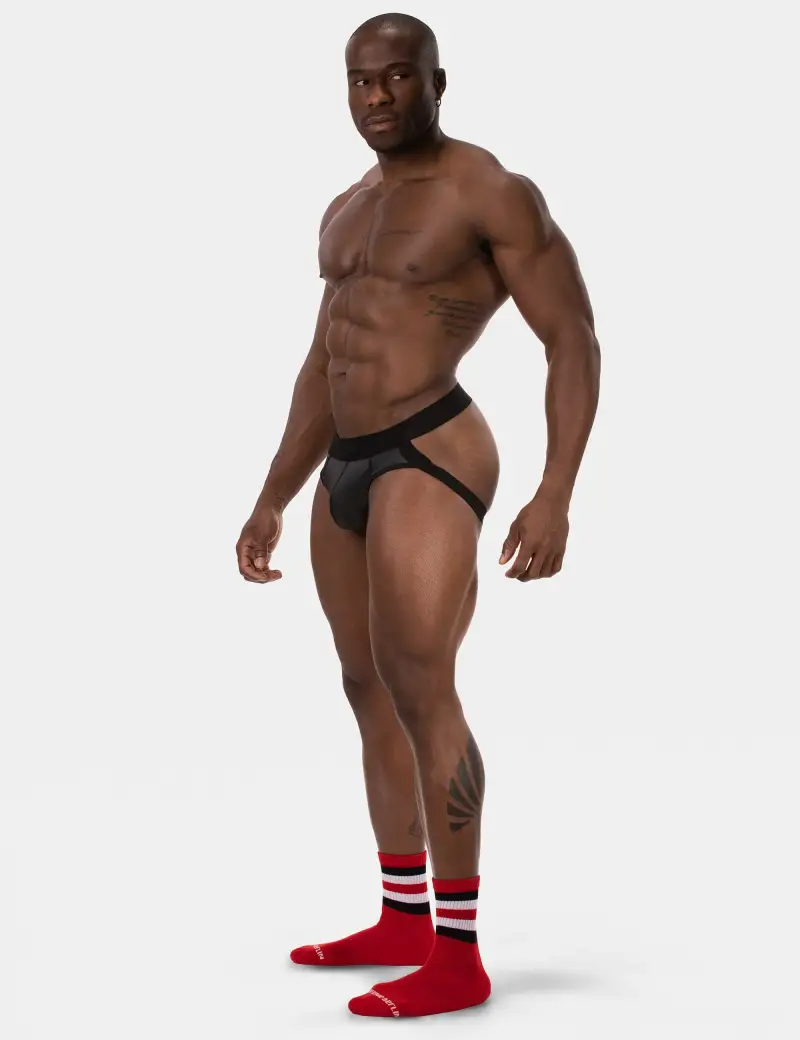Sexy black man modeling full Greek god body and chisled abs.