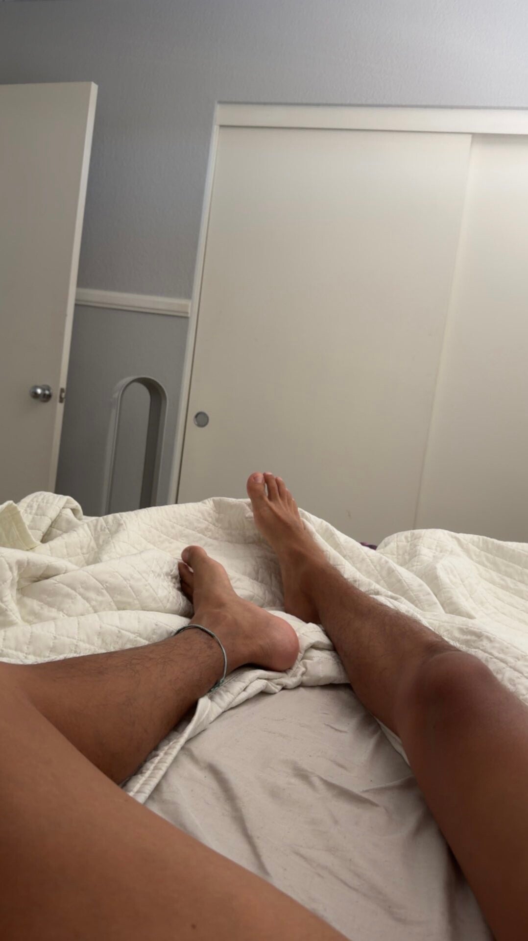 legs-and-feet-black-man-in-bed-standard-8sda0e.jpg