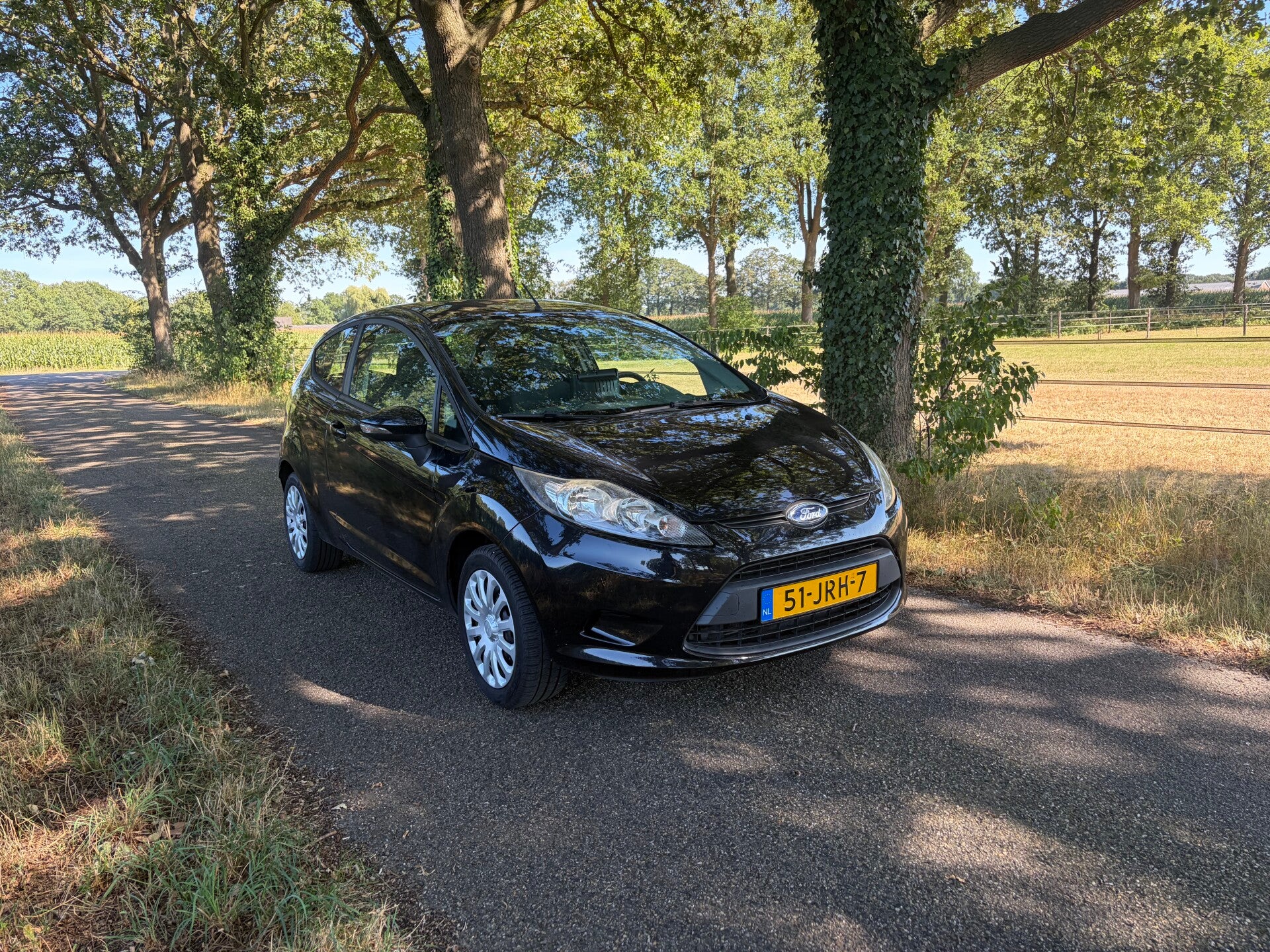 Ford Fiësta 1.25 44KW 3DR 2009 Zwart, NWE distributie, Airco