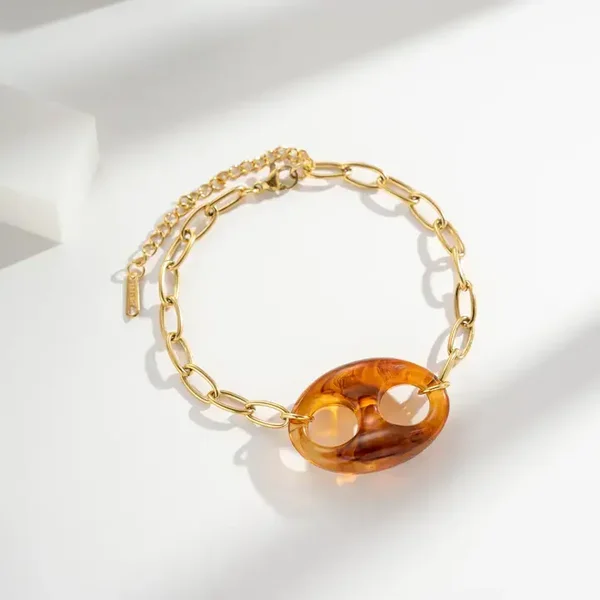 Vergulde roestvrijstalen armband met schakel van hars