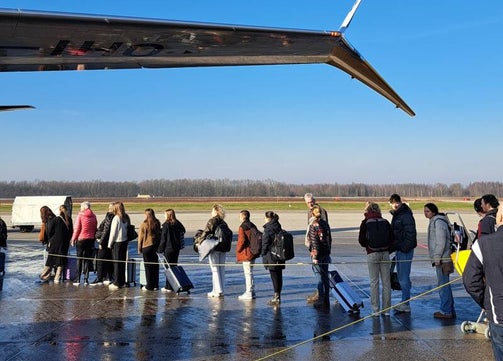 Boarding while deplaning