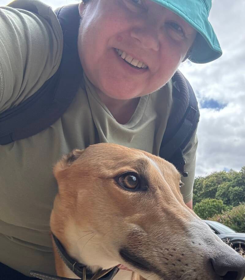 Fred the greyhound and Jo the dog walker