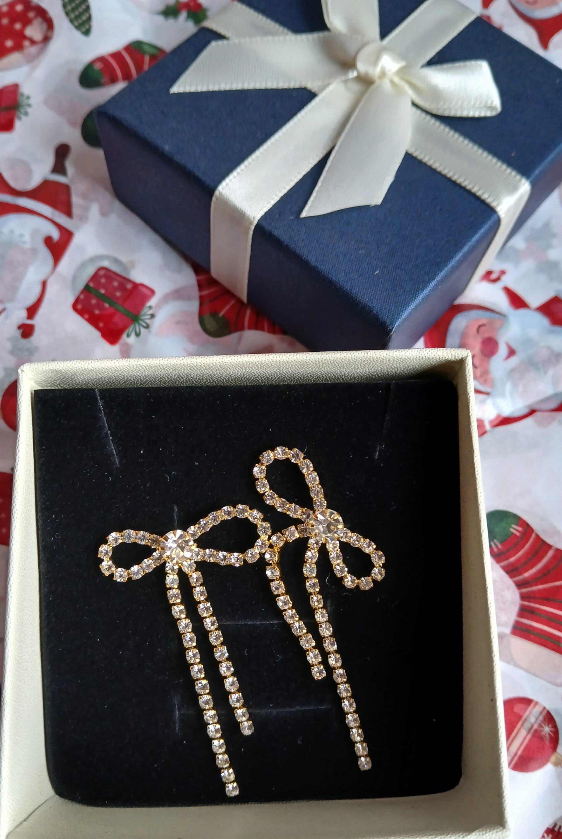 Elegante strikvormige oorbellen - Goudkleurig