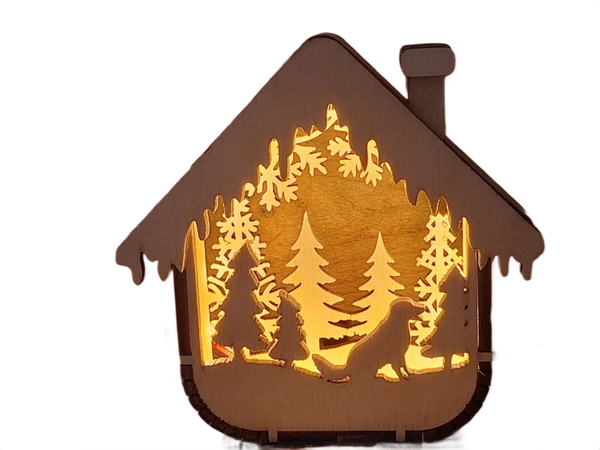 Kerststalhuisje model sit on it