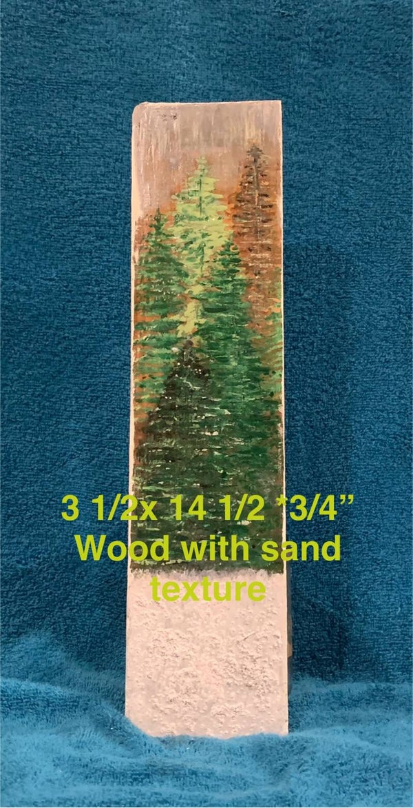 Wood art-Pine trees with sand at the bottom for texture.