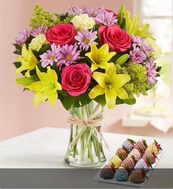 Rosas y fresas con chocolates