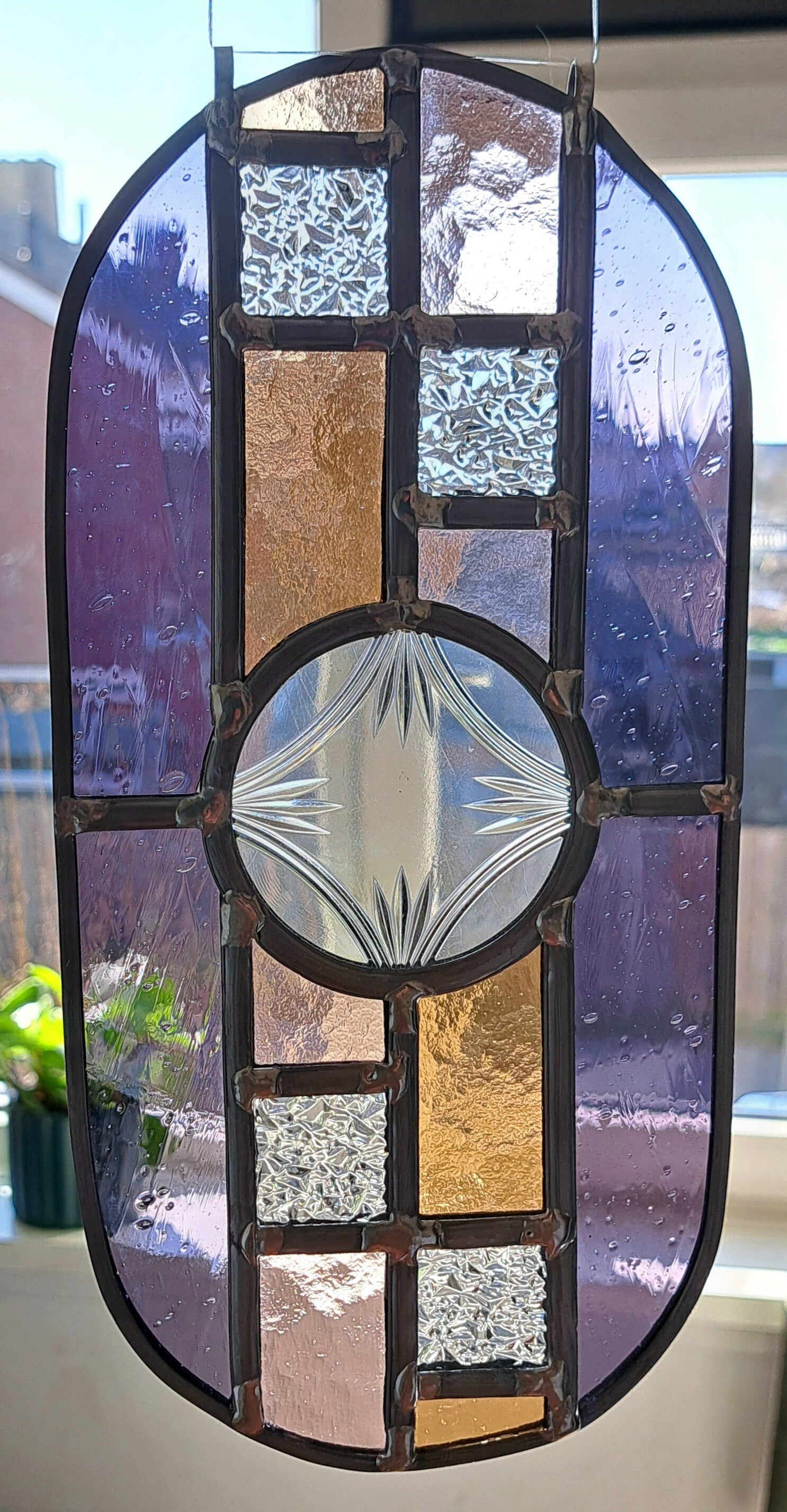 Raamhanger ovaal. Paars/roze