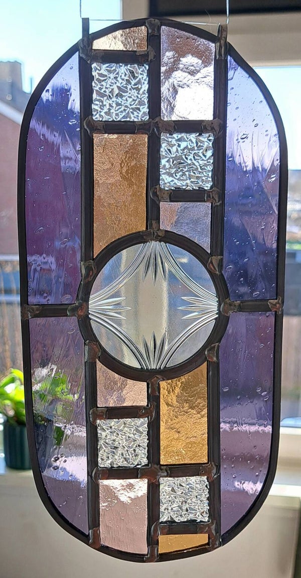 Raamhanger ovaal. Paars/roze