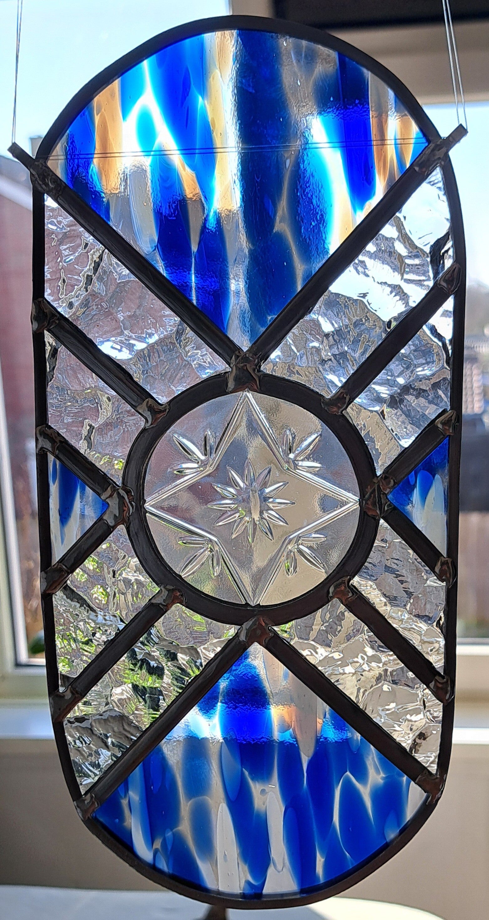 Raamhanger ovaal. Blauw spirit glas