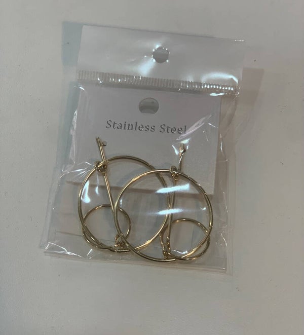 Créoles filaires enchevêtrées design artistique