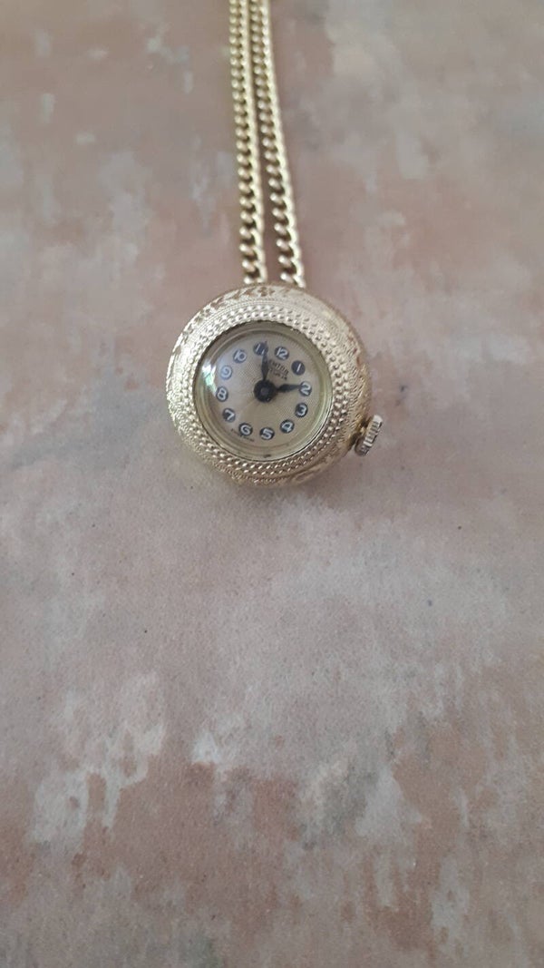 Sold SoldStunnning Mentor 15 Jewel Swiss globe shape wind up watch with chain##
