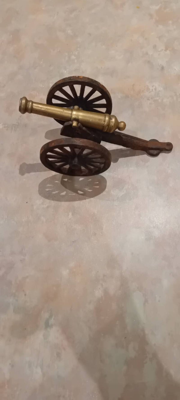 Vintage brass model cannon and metal/wrought iron carriage. Uk Postage Only