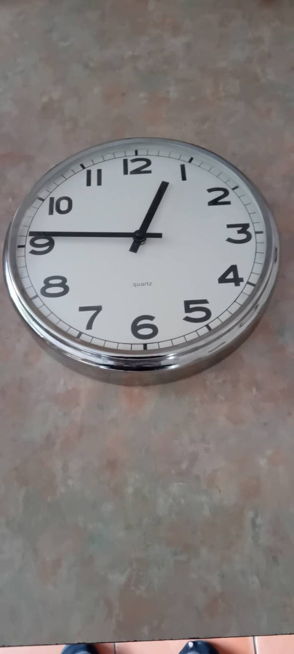 Large chrome surround wall clock. Uk Postage Only