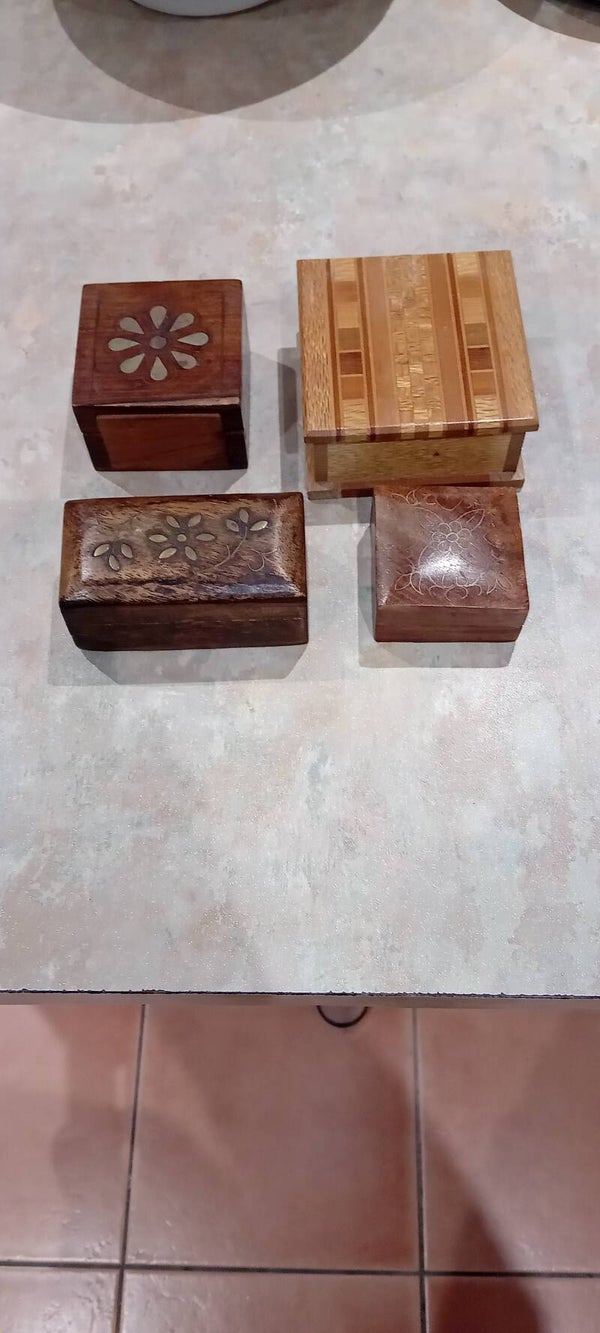Sold Sold pending 4 attractive small wooden boxes.  Uk Postage Only.