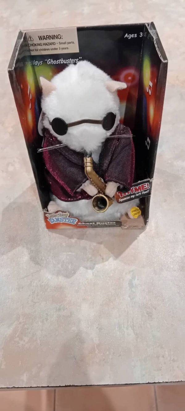 Dancing Hamster plays"Ghost Buster"Complete with sax appeal.Uk Postage Only