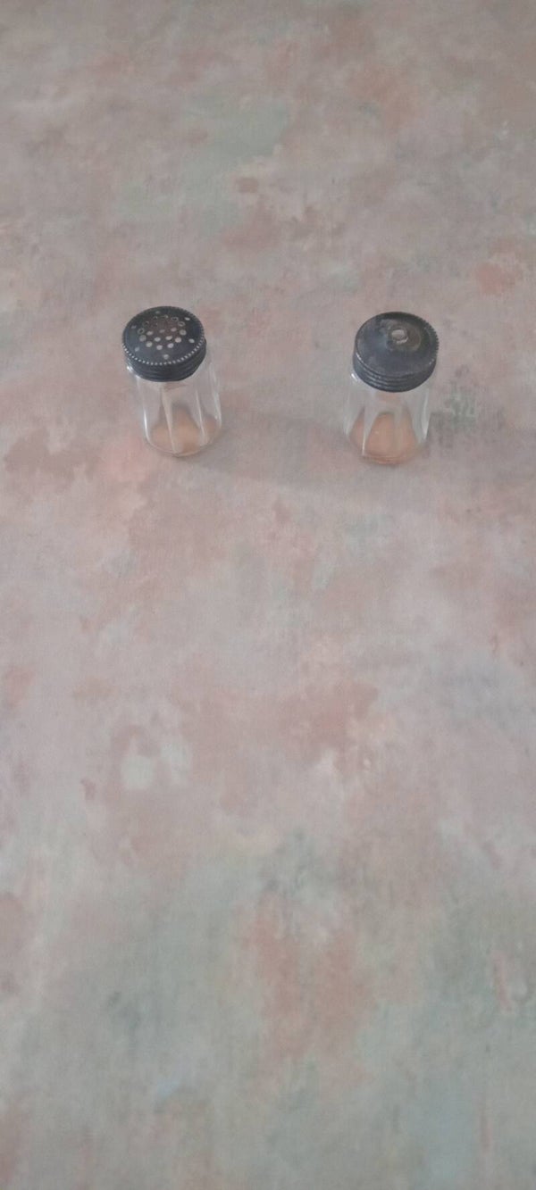SOLD SOLD PENDING Vintage/Antique Sterling silver glass salt and pepper shakers.  Uk Postage Only