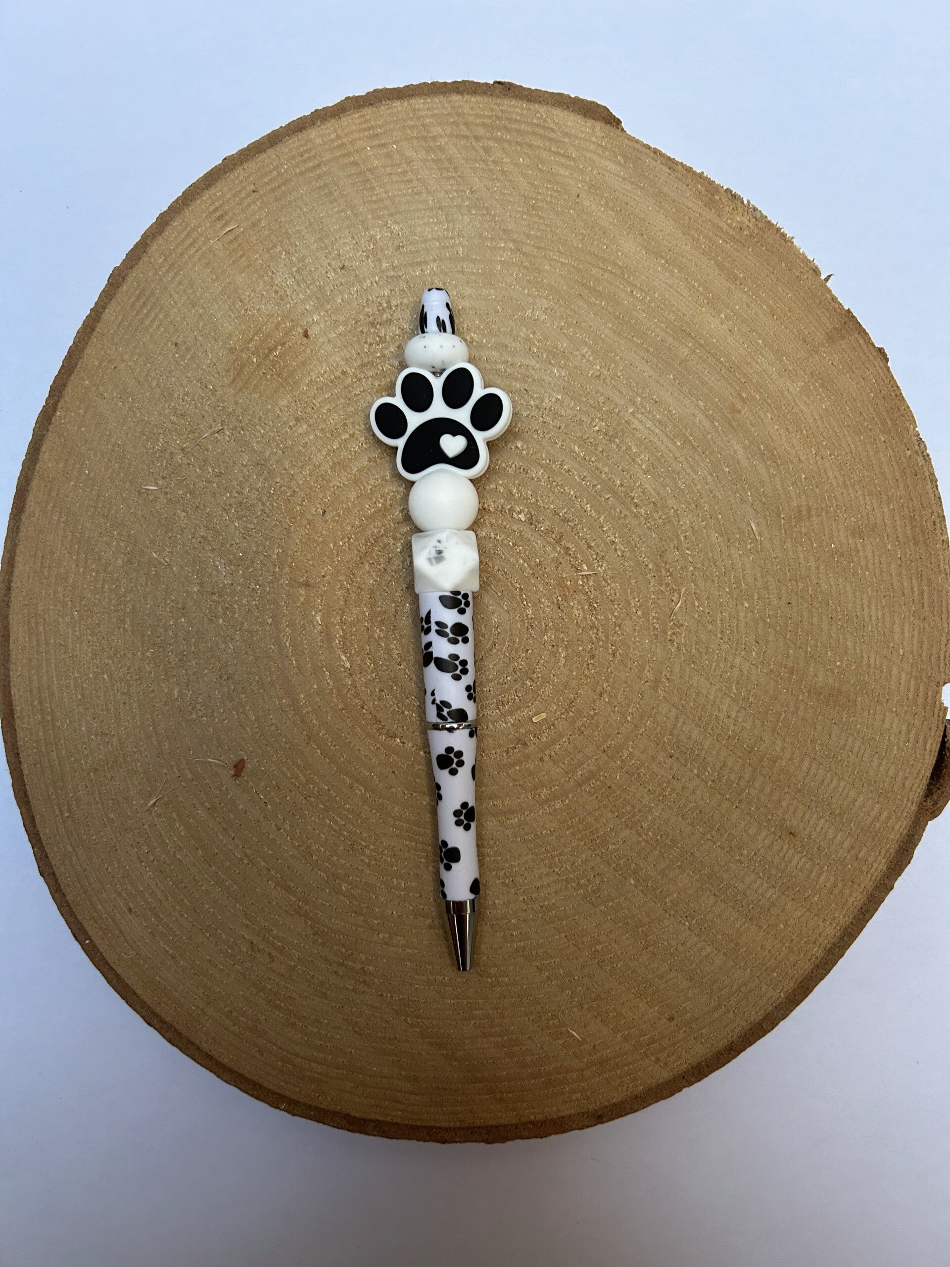 pen met hondenpoot motief