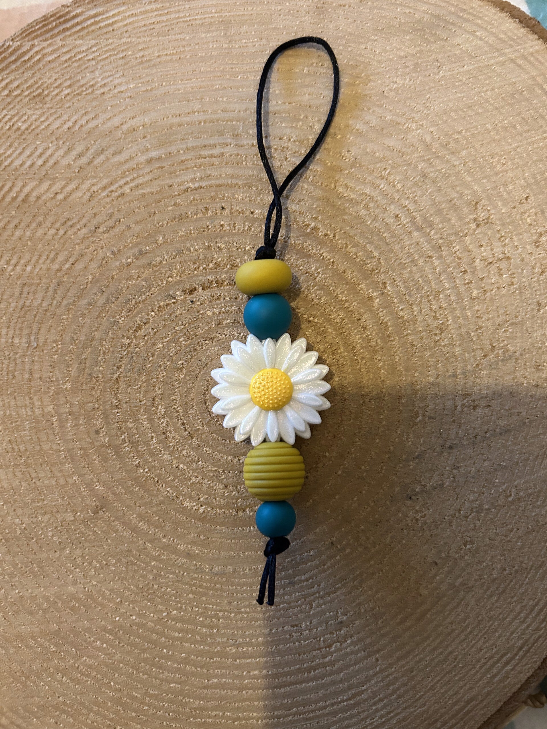 jaszipper met een madeliefje