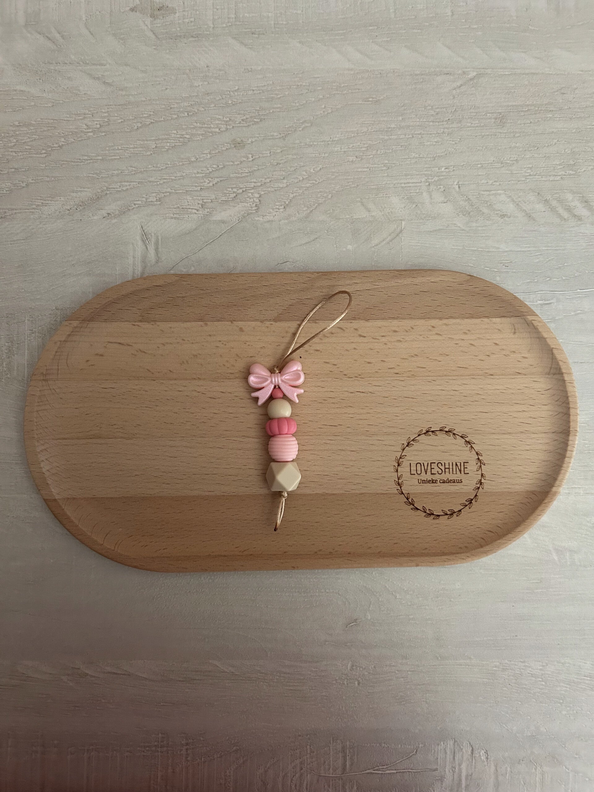 Jaszipper roze glinsterende strik