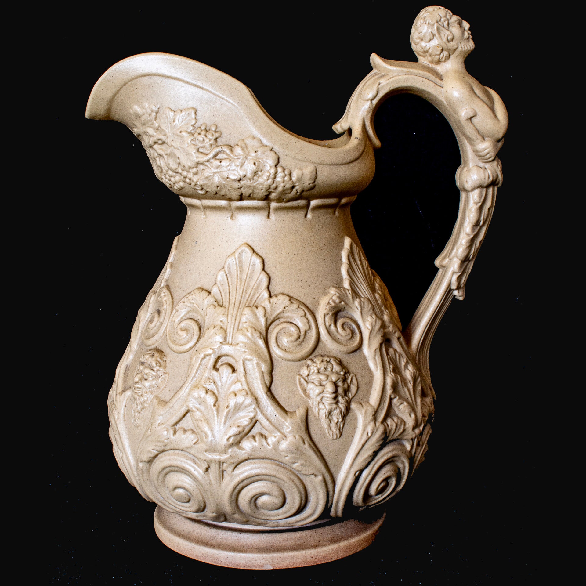 A Large Ridgeway's Drabware Bacchus & Pan Relief Moulded Pitcher