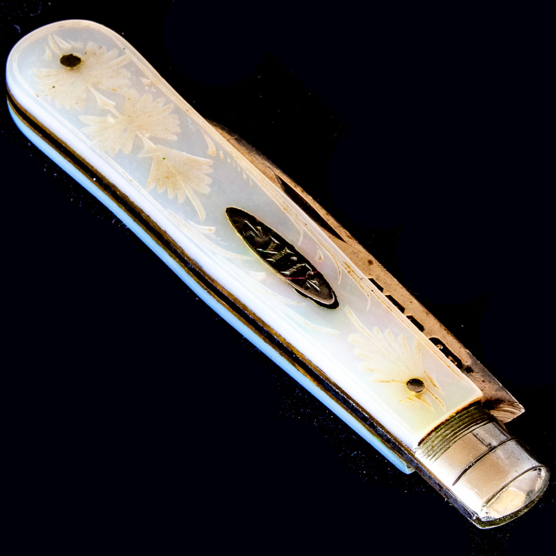 An antique fruit knife dating to he first year of WW1 (1914), with  sterling silver blade