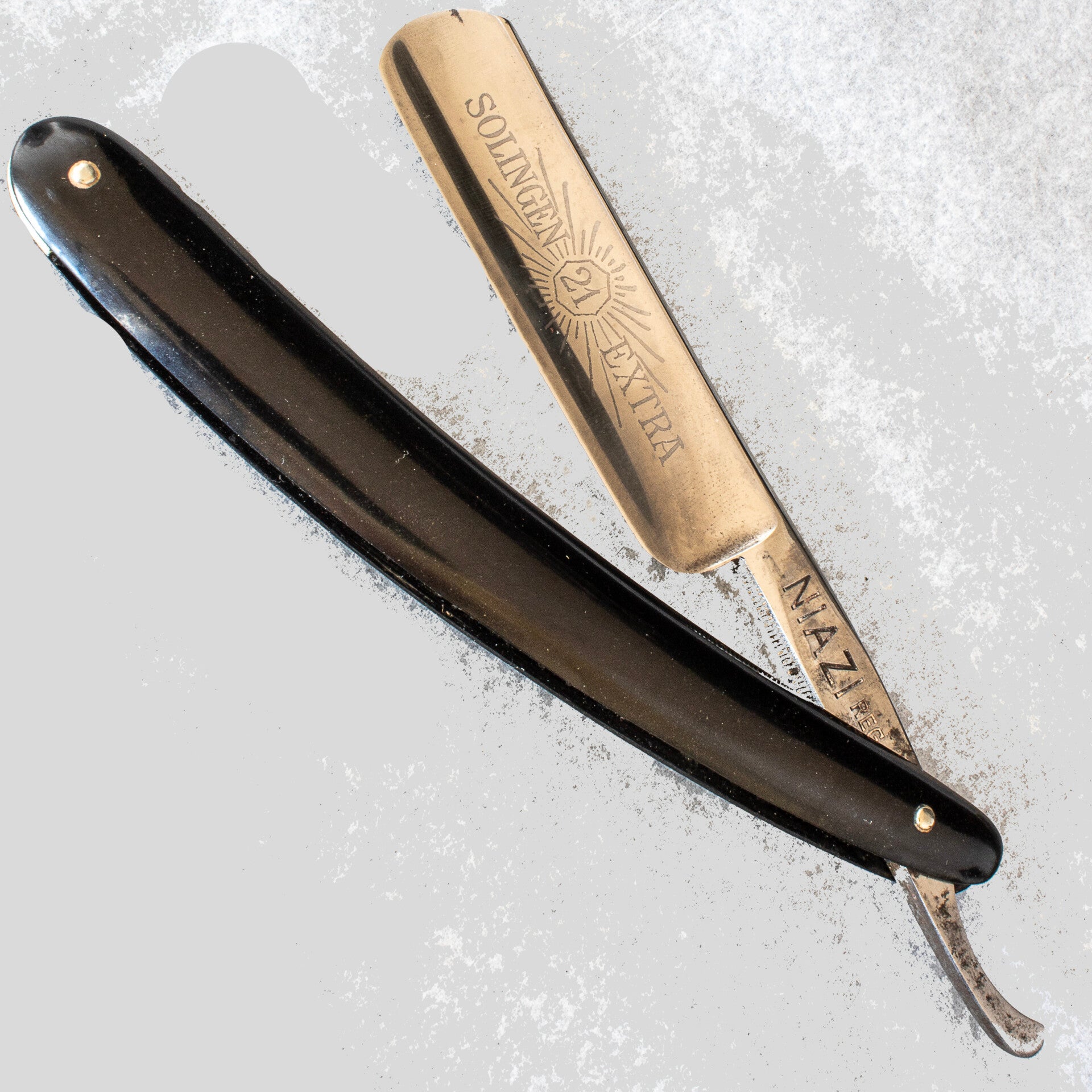 Rare antique Niazi brand straight razor with a 13/16th blade in original box