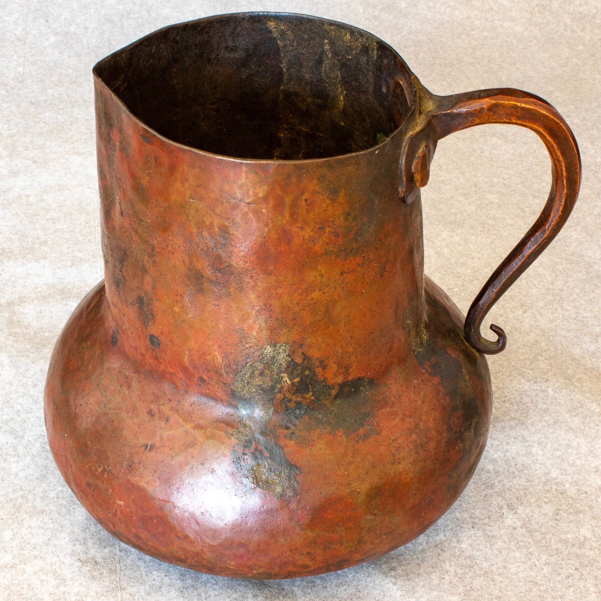 Small 19th century copper pitcher