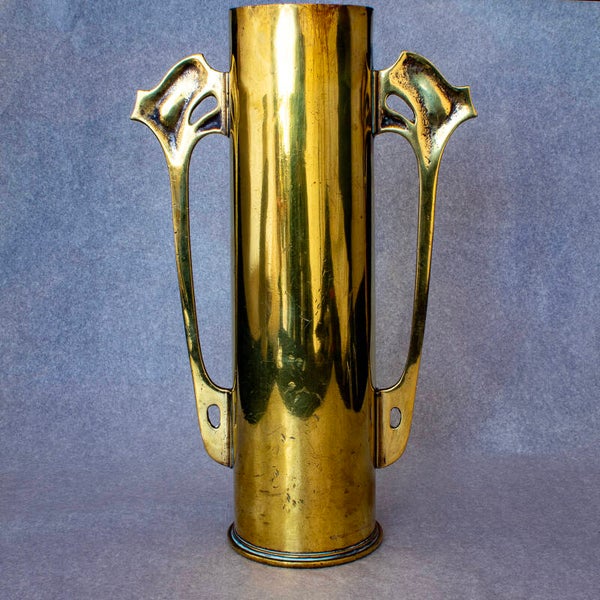 Art Nouveau style, two handled brass vase, created by trench art