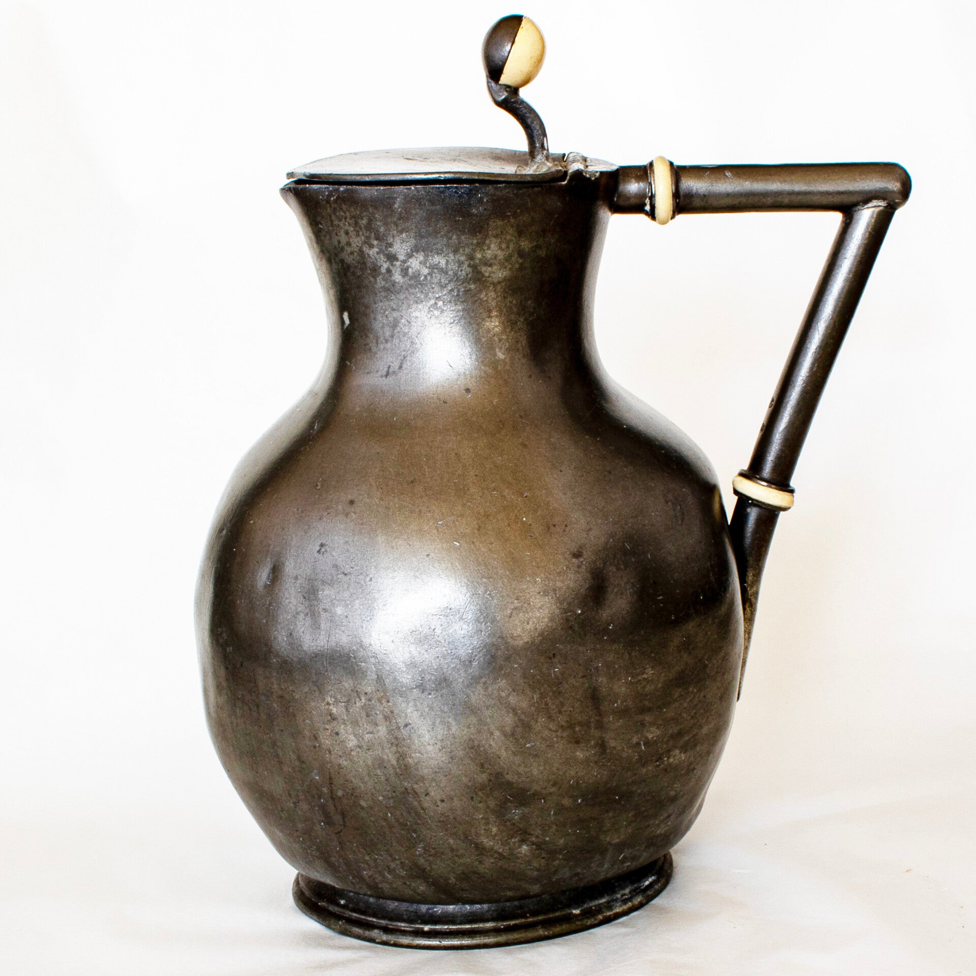Lidded pewter jug c1900 by W.W. Harrison and Co.