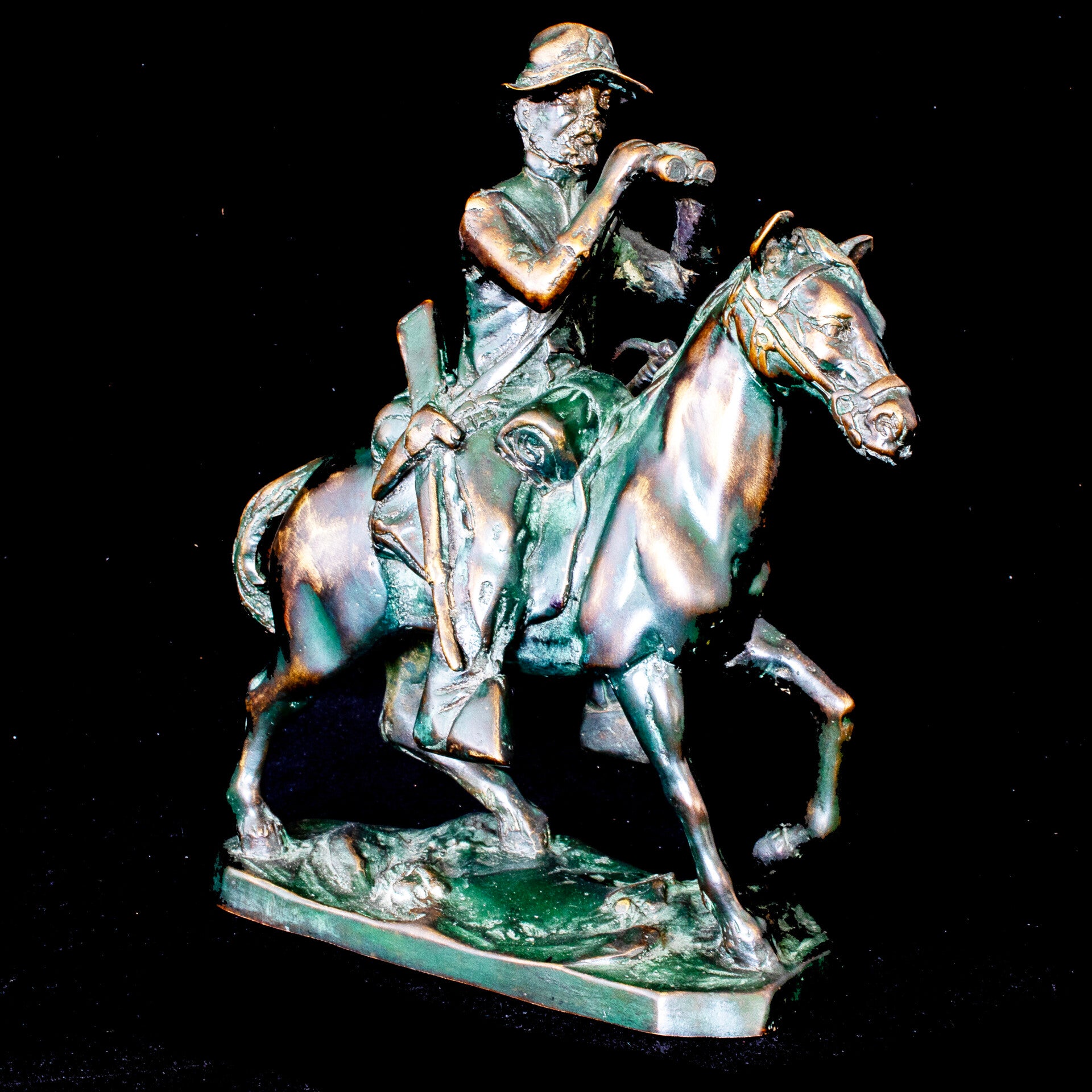 Bronze statuette of a U.S. Army scout in the style of Frederic Remington