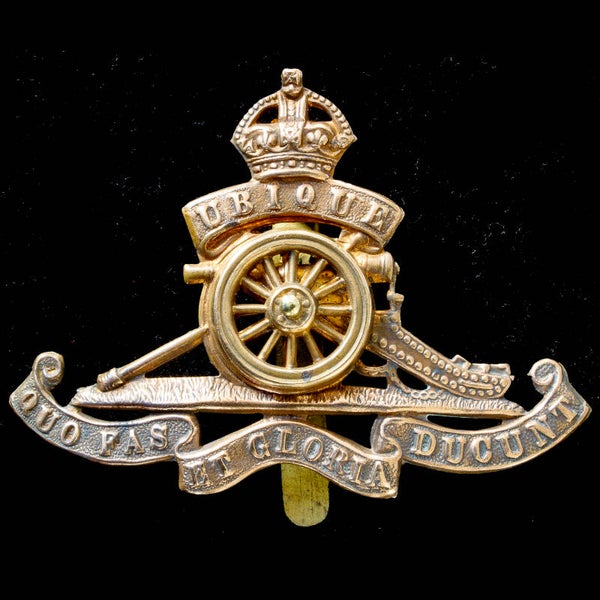 The Royal Regiment of Artillery cap badge circa 1910’s with spinning wheel