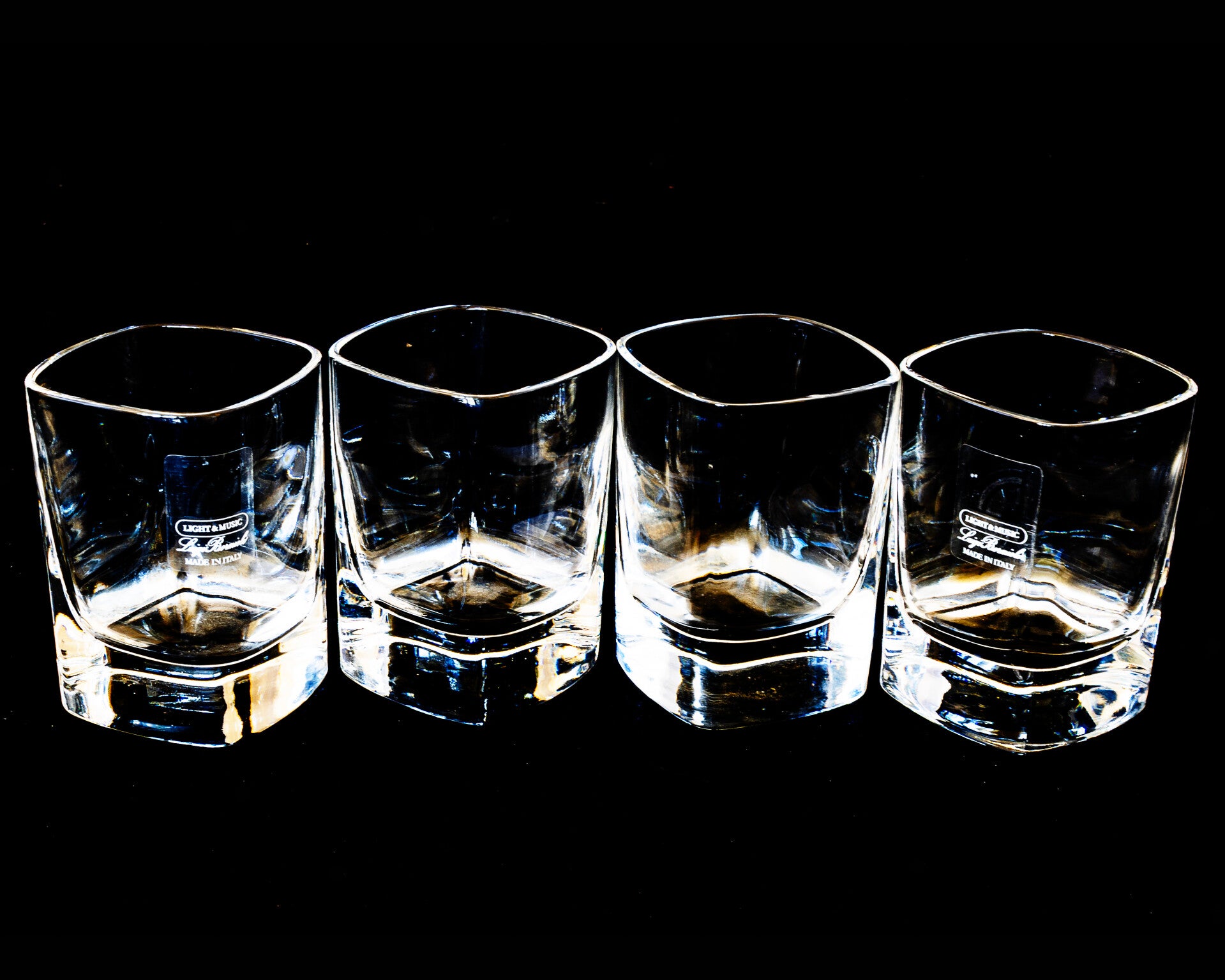 4 Luigi Bormioli lead-free crystal shot glasses from the Light and Music Collection