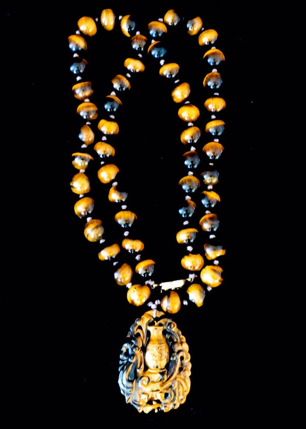 Quality ‘Tiger’s Eye’ necklace with carved pendant & 52 hand knotted spheres
