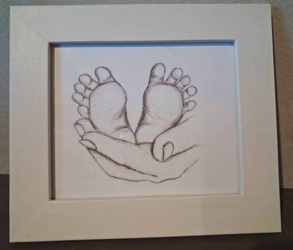 CRADLED BABY FEET