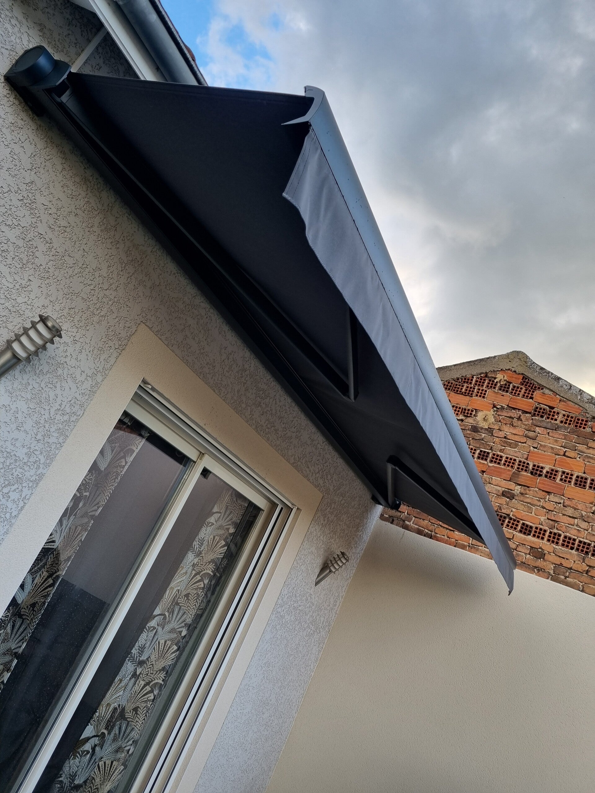 Store extérieur motorisé à Firminy