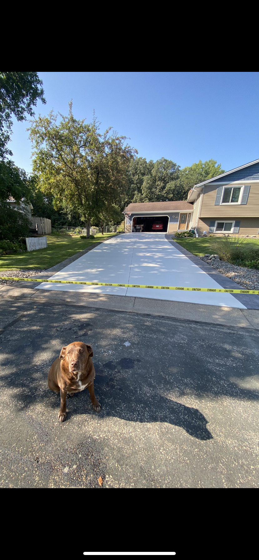 Concrete driveway sealing project in Wayzata MN by Pro Shield Concrete Sealing