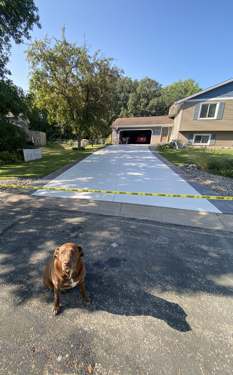 Concrete driveway sealing project in Wayzata MN by Pro Shield Concrete Sealing