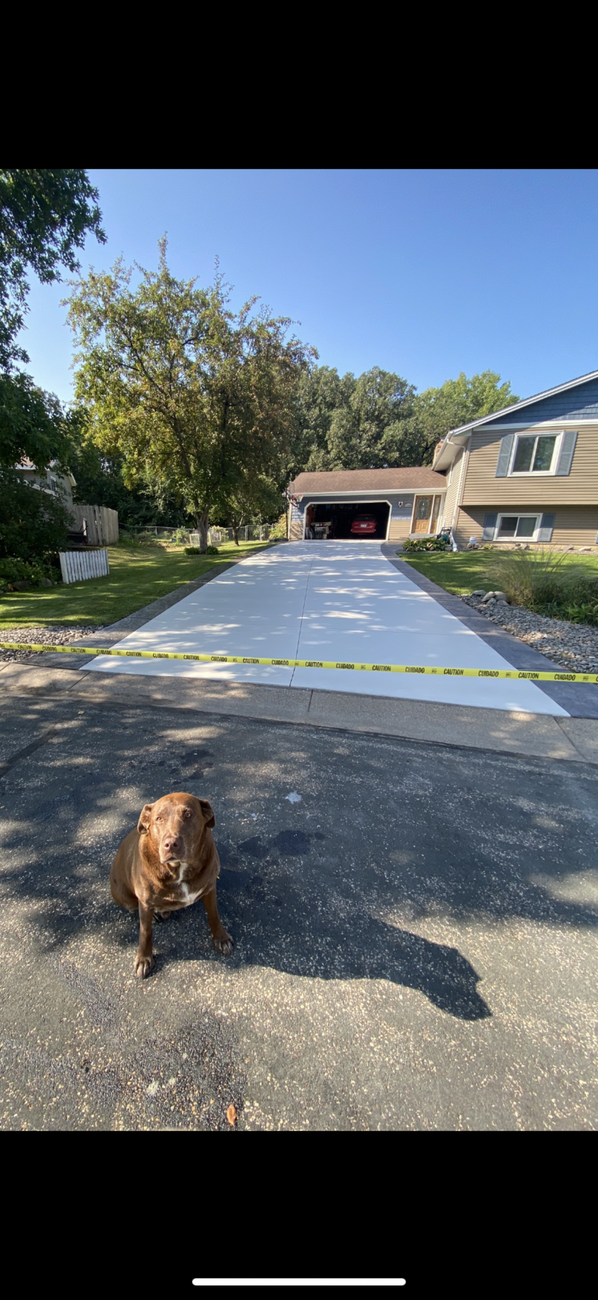 Concrete Driveway Sealing Project in Woodbury MN by Pro Shield Concrete Sealing 
