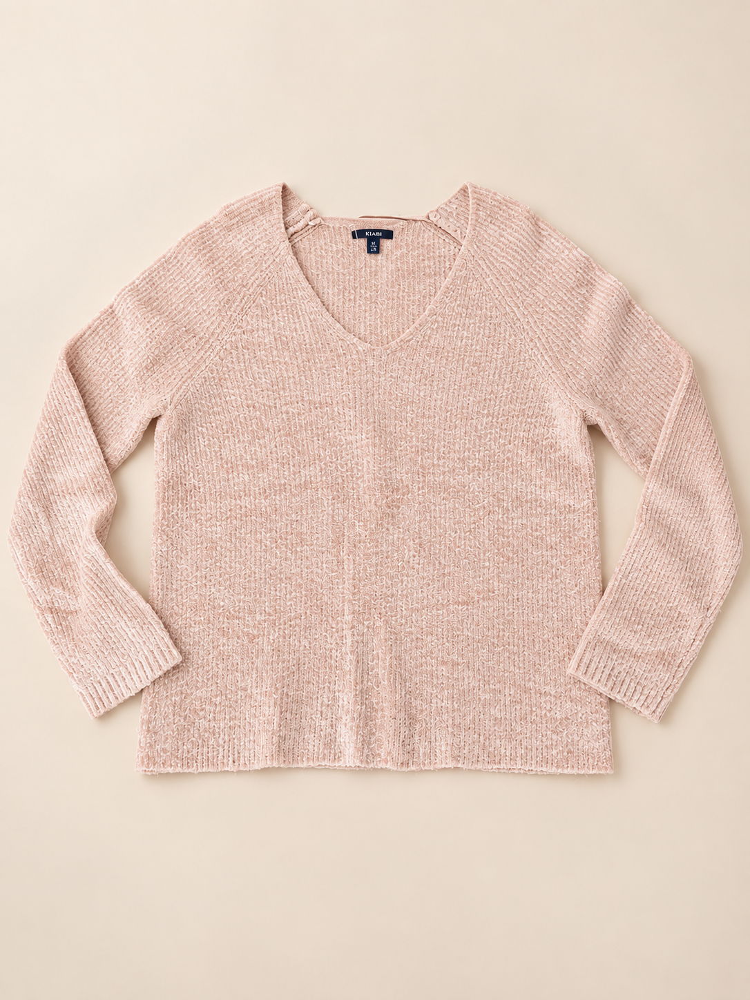 Pull rose poudré en maille douce