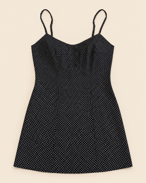 Robe noire à pois blancs